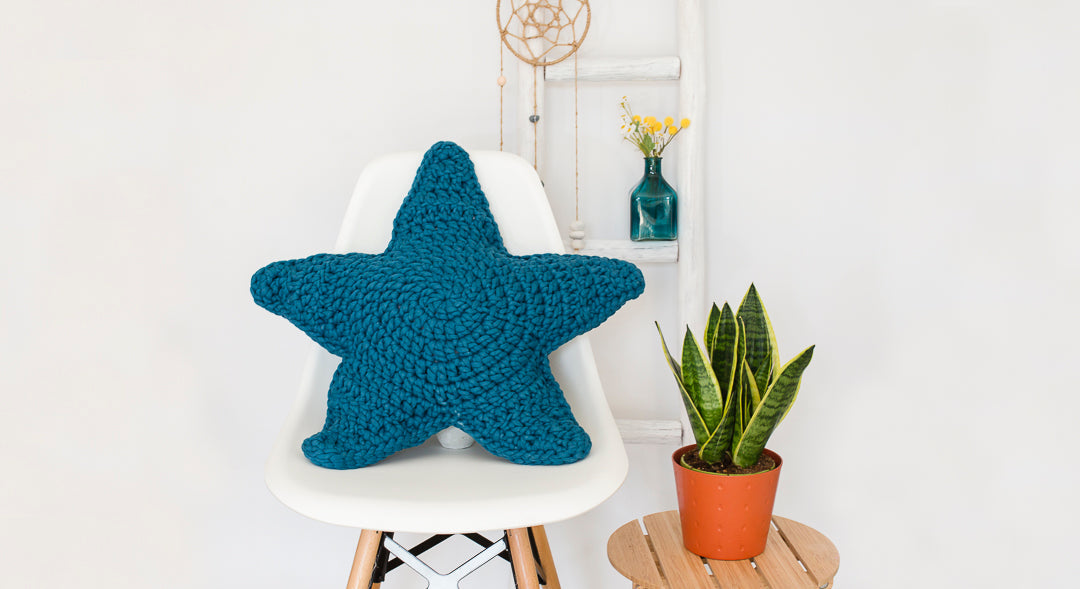 Cojín estrella Guata